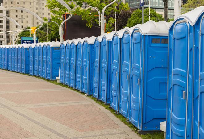 a row of portable restrooms set up for a special event, providing guests with a comfortable and sanitary option in Argyle TX